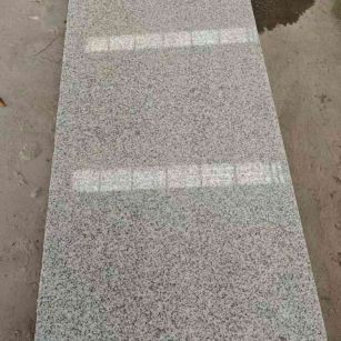 内蒙古芝麻白光面毛板